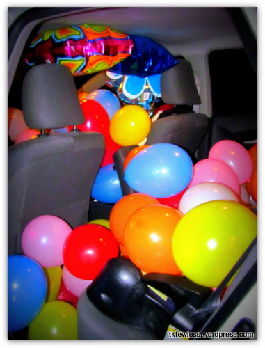 Birthday balloon surprise in a car